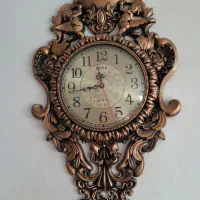 ساعت مجسمه شلف