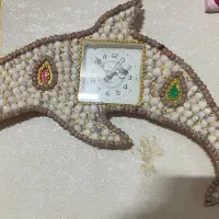ساعت دیواری دلفین همراه سطل و جا دستمالی