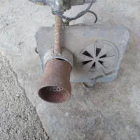 مشعل قدیمی و پمپ