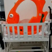 تخت نوزادی و الکلنگ