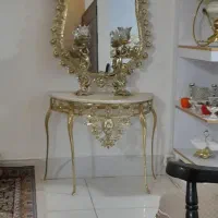 ۱عدد اینه کنسول نونو جنس برنز اصل با دوتا شمدانی