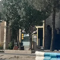یک باب مغازه باملکیت ویک خانه مسکونی
