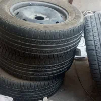 لاستیک 205 کویر تایر سالم با رینگ و قالپاق