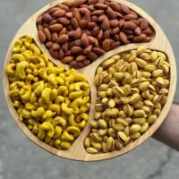 آجیل پسته اکبری 380 بادام هندی 390 بادام شو