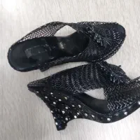 نیم بوت|کیف، کفش، کمربند|اصفهان, باغ فدک|دیوار