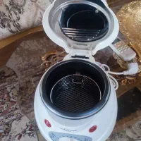 تعدادی وسایل سرخ کن سبزی خردکن گلدان