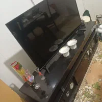 تلویزیون و میز تلویزیون درحد نو