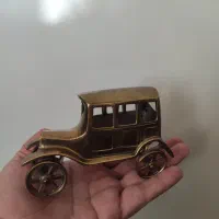 ماشین طلایی رنگ ذاتی برنجی