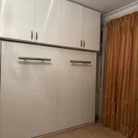 تخت خواب دونفره کم جا همراه با کمد جادار