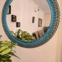 آینه گرد تزئینی آبی فیروزه ای نگین دار