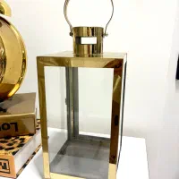 آویز فانوس شمع کنار سالنی