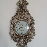 ساعت دیواری طلایی شیک