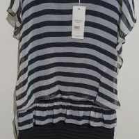 فروش انواع لباسهای اسپرت و مجلسی با قیمت مناسب