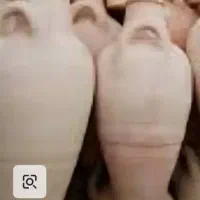 کوزه سفالی کره گیری