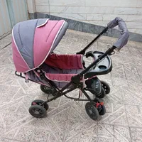 کالسکه به همراه کاور برای روزهای بارانی