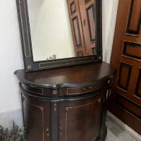 آیینه و کنسول و ساعت و شمعدان چوبی