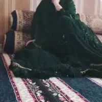 لباس تمام منجق دوزی هست تعویض دارم