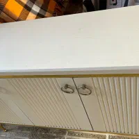 کنسول طلایی با آیینه دایره ای در حد نو