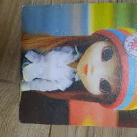 عروسک بابی روی تخته شکستی