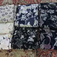 تعدادی چادر مجلسی دوخته شده نو