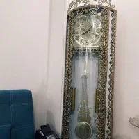 میز تی وی برنز و ساعت قدی
