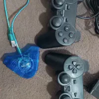 دوعدد دسته pes2 به همراه رابط کامپیوتر