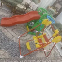 سرسره و تاب و خرس بزرگ