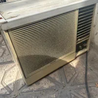 کوار گازی توشیبا پشت پنجره ای