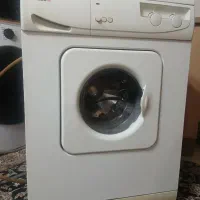 لباس شویی ابسال