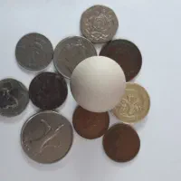 سنگ آسیاب ( الماس ) و سکه کلکسیونی
