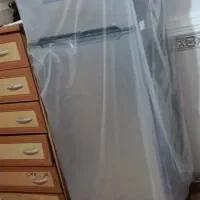 یخچال نو داخل کارتن دلگان
