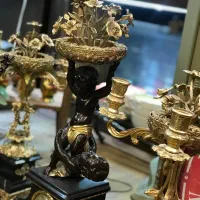 ساعت و شمعدان  مجسمه برنز پسر بچه ها برنزی