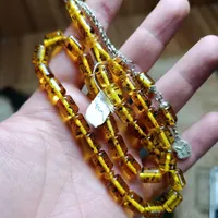 تسبیح کهربا پودری زردار