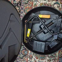 جک ماشین پژو  و لاستیک