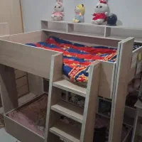 تخت دو طبقه همراه کتابخانه