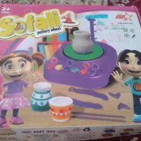 یک عدد سفالگری در حد نو و یک عدد تاپ تاپ بچه گانه