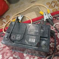 باتری ماشین کارکرده، بهمراه کابل اتصال باتری