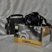 «Nikon D3400 شاتر پایین + لنز + رم»