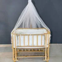 تخت کنار مادر،گهواره چوبی