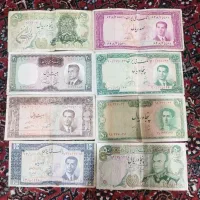 تعدادی اسکناس و سکه