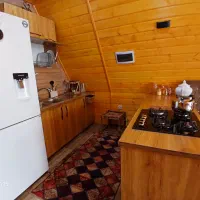 کلبه سوئیسی|اجارهٔ کوتاه‌مدت ویلا و باغ|لاهیجان, بازکیاگوراب|دیوار