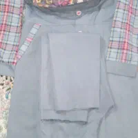 یه دست لباس فرم نونو با کیف