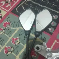 لوازم مصرفی هوندا ۱۲۵ آینه کلیک و ی جفت هدلایت|قطعات یدکی و لوازم جانبی|اصفهان, پوریای ولی|دیوار