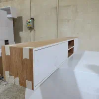 میز تلویزیون   و تخت خواب