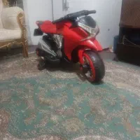 موتور شارژی و مقداری اسباب بازی