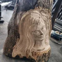 کنده مجسمه چهره کار دست