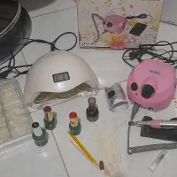 وسایل و لوازم کاشت ناخن سوهان برقی یووی و لاک ژل