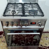 اجاق گاز چهار شعله فر تمام استیل سینجر درحد نو