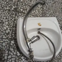 روشویی و شیر آب