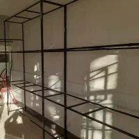 رگال آهنی لباس فروشی